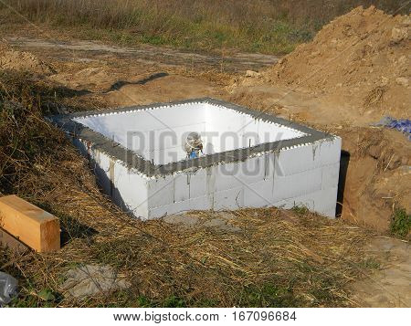 Building New Water Bore with Insulation. Installing pumping air from compressor into from new constructed water bore or well as process of cleaning and filtrating water.