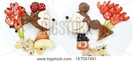 creative breakfast food with fruit and chocolate sweet cream on bread