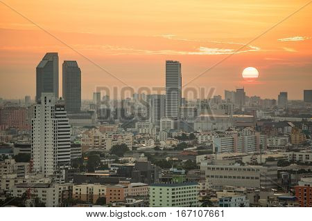 Aerial view of urban city skyline at sunrise cityscape in downtown of Bangkok Thailand