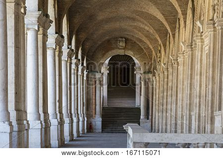 VICENZA,ITALY-APRIL 3,2015:view of the famous colonnade of the Palladian basilica in the center of Vicenza during a sunny day.