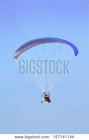 Nice view of paramotor in the blue sky