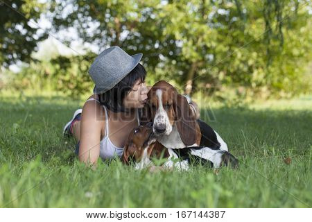 The woman with the dogs in the countryside Selective focus and small depth of field lens flare