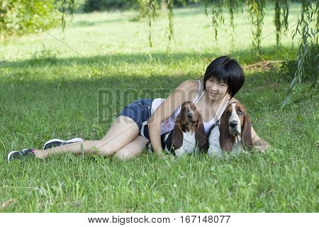 The woman with the dogs in the countryside Selective focus and small depth of field lens flare