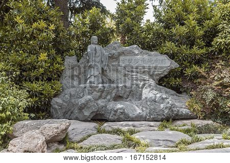 China, Xian, Da Ci En Temple. Buddha Sculpture, pointing the way to the temple.