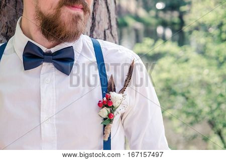 Man with a bow tie. Wedding Boutonniere.