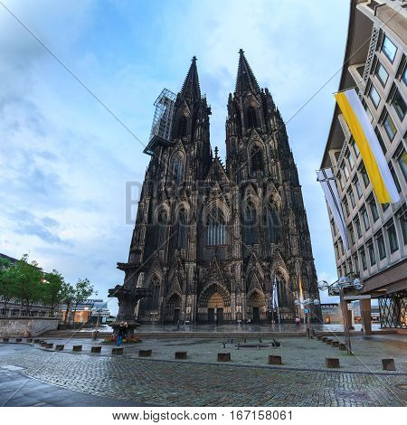 Cologne Cathedral on the west side and Square Roncalli in Cologne, Germany. The Dom - Roman Catholic Gothic cathedral