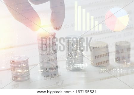 pile coin money with account book finance and banking concept for background.concept in grow and walk step by step for success in business