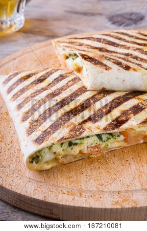 Mexican food fajitas served on wooden board