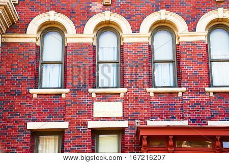 Background of red brick wall pattern texture. Great for graffiti inscriptions.