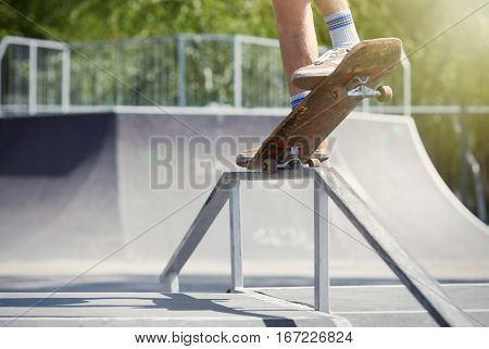Skater Doing Nose Grind On Fun-box In Skatepark