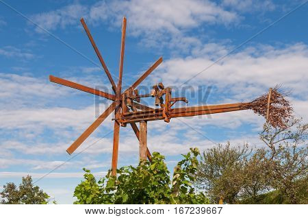 klapotetz - a traditional styrian wind wheel in a vineyard