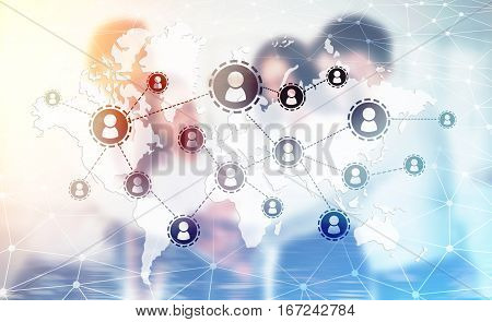 Man and woman looking at a network sketch and a world map drawn on a glassboard. Toned image. Double exposure.