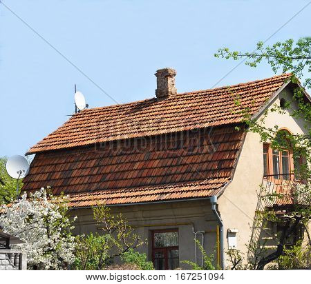 House renovation with roofing old ceramic tiles. Close up on roofing with old ceramic tiles.