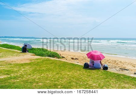 Sitting At The Beach