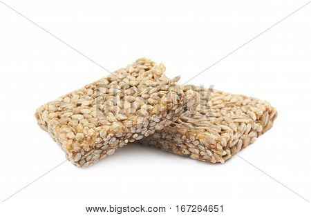 Two pieces of gozinaki confection sweets isolated over the white background