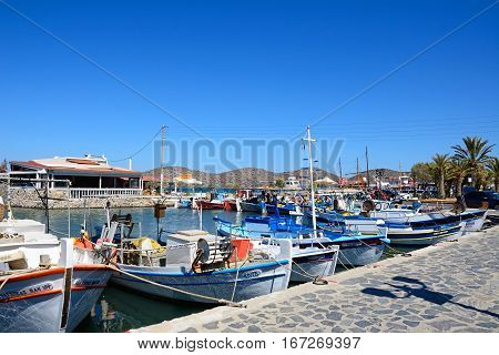 ELOUNDA, CRETE - SEPTEMBER 17, 2016 - Traditional fishing boats in the harbour Elounda Crete Greece Europe, September 17, 2016.