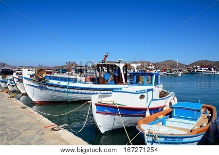 ELOUNDA, CRETE - SEPTEMBER 17, 2016 - Traditional fishing boats in the harbour Elounda Crete Greece Europe, September 17, 2016.