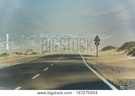 Dangerous and rare sandstorm Calima - cloud of sand blown in from the Sahara Lanzarote Spain.