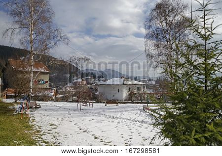 Residential district of bulgarian houses in winter village Pasarel, Bulgaria