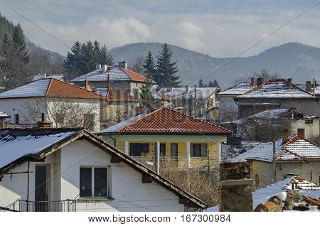 Residential district of bulgarian houses in winter village Pasarel, Bulgaria