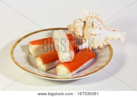 Seafood crab meal on plate with shell isolated on white background