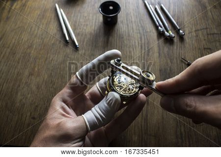The procces of watch repair with the special tools