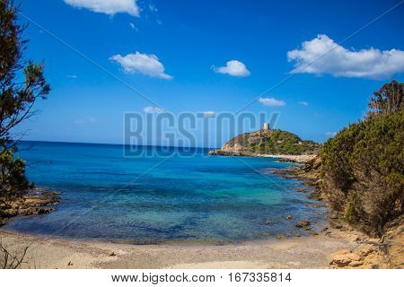 Sardinia Italy Torre di Chia bay with blue sky