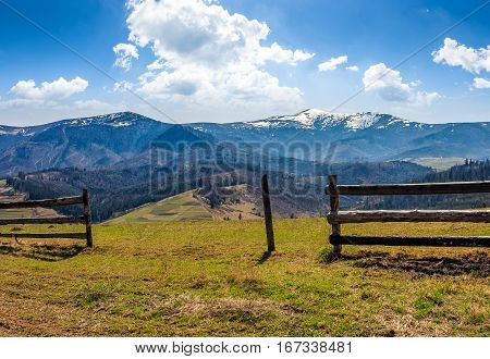 Fence On Rural Field In Spring