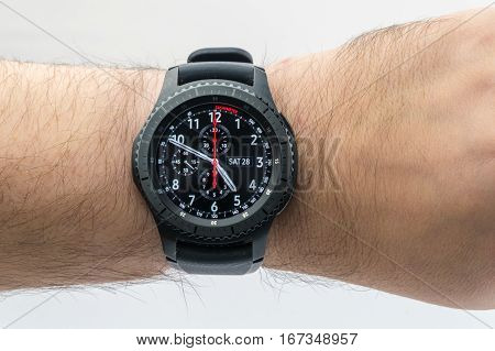 CHESTER UK - January 28 2017: Samsung Gear S3 smartwatch shown on a male wrist