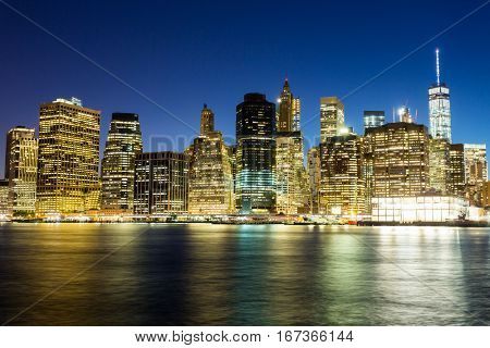 Illuminated manhattan night view from hudson