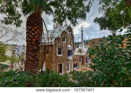 Barcelona, Spain - November 24, 2016: Ginger Bread House in Park Guell in Barcelona Spain. It is a public park system composed of gardens and architectonic elements located on Carmel Hill in Barcelona Catalonia (Spain).