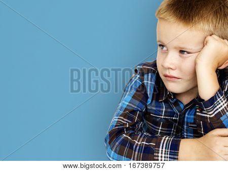 Caucasian Little Boy Frowning Sulking