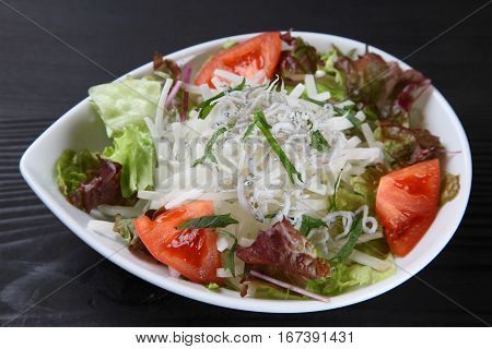 studio shot of salad with boiled whitebaite