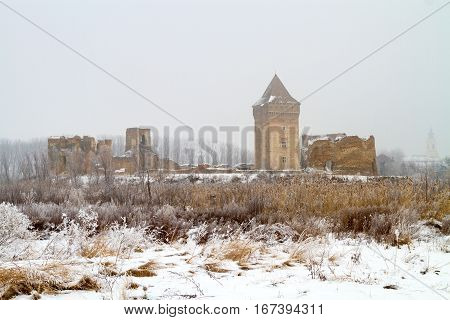 Ruins of medieva Bac fortress in Serbia on foggy winter day