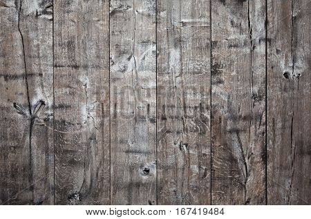 Old weatherd gray wooden fence background, horizontal