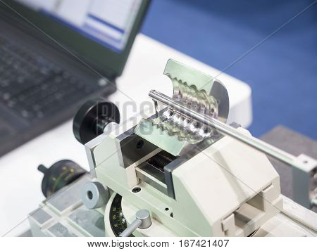 Operator Inspection Automotive Part By Contour Measuring Machine