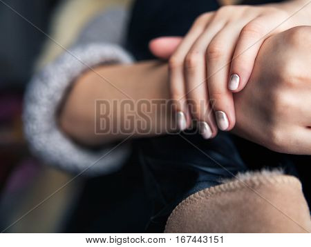 Stylish gray manicure with overflowing Fashion hands fingers