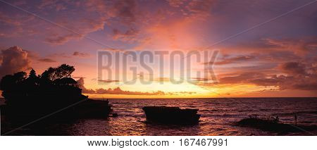 Sunset at Tanah Lot temple. Bali island Indonesia.