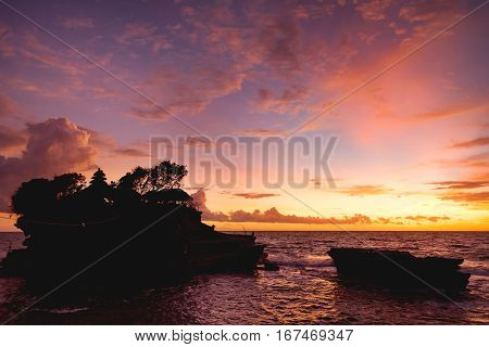 Sunset at Tanah Lot temple. Bali island Indonesia.