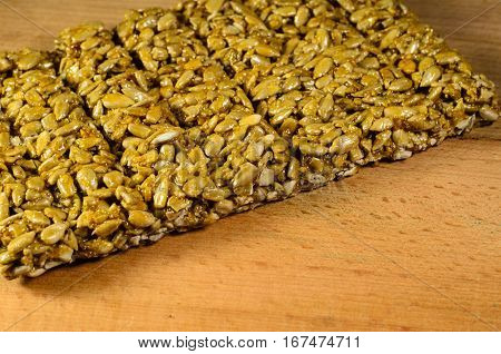 Brittles with sunflower seeds on a wooden table
