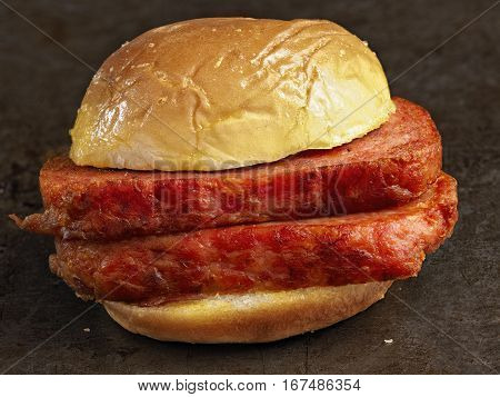 close up of rustic spiced ham luncheon meat sandwich