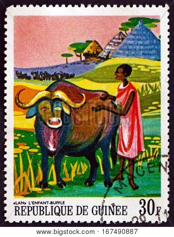 GUINEA - CIRCA 1967: a stamp printed in Guinea shows Lan the Child Buffalo African Legends circa 1967