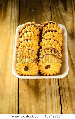 Сookies with condensed milk on a wooden table