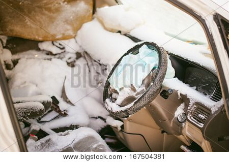 Accident Automobile. Salon Crashed Car Covered With Snow. Supplemental Restraint System