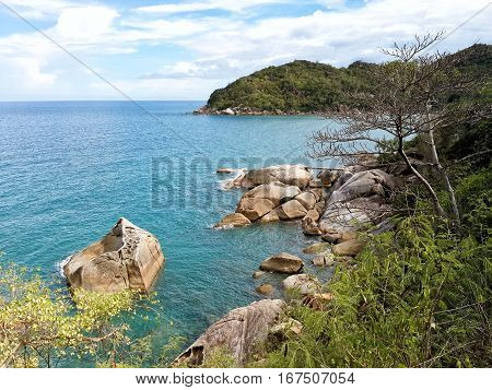 Views of the rocky coast of the azure sea. Koh Samui Thailand.
