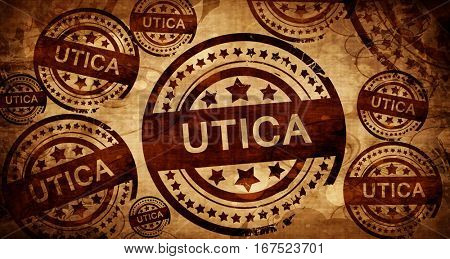 utica, vintage stamp on paper background