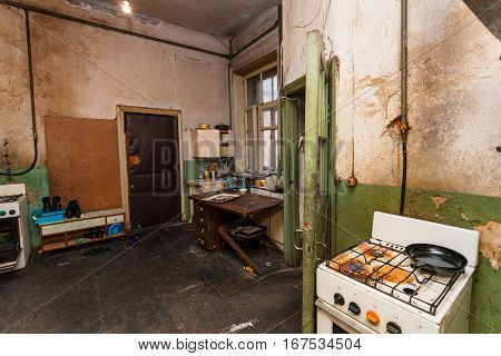 Dirty kitchen is in the temporary apartment for living (existence) refugees