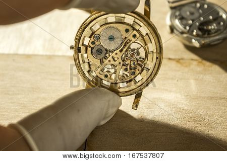 The procces of watch repair with the special tools