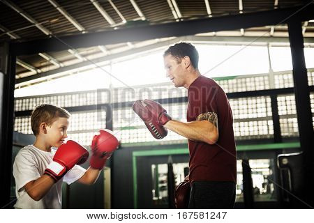 Boy Boxing Training Punch Mitts Exercise Concept