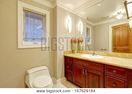 Light Tones Bathroom Interior With Vanity Cabinet